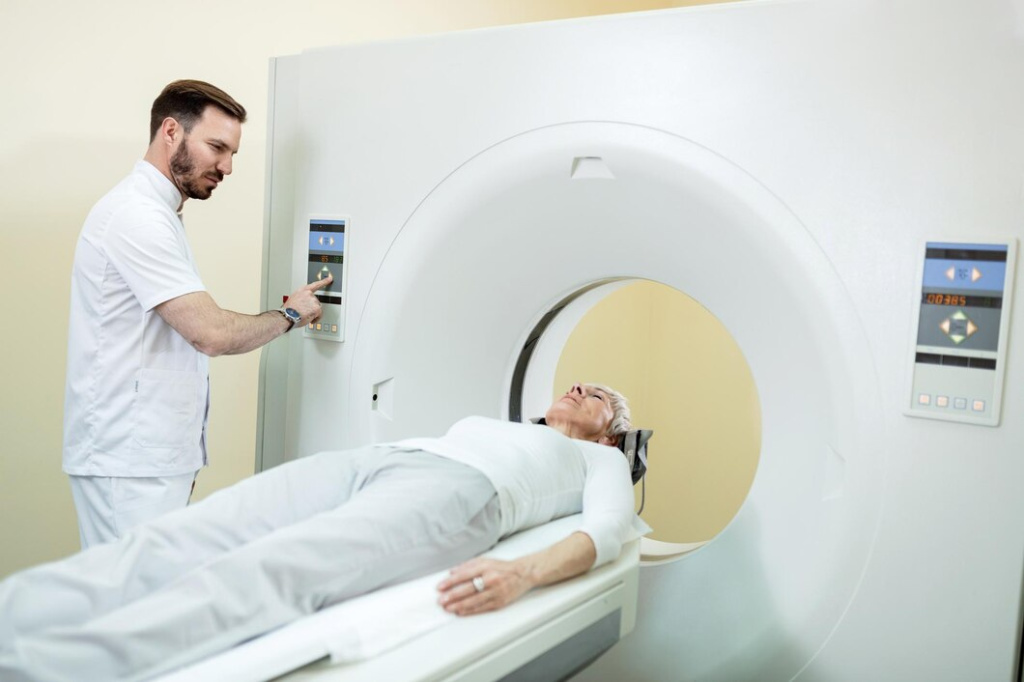 medical-technician-starting-mri-scan-procedure-mature-patient-clinic_637285-346.jpg